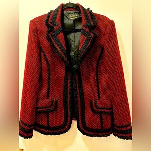 Elegant, fun,retro Burgundy Jacket with decorative black fringe trim. Size med.